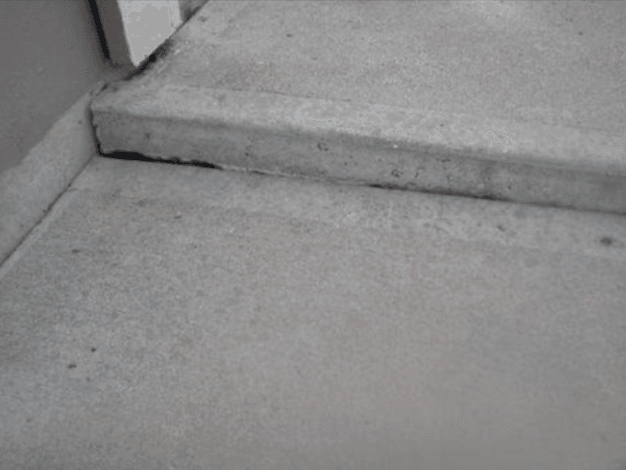 Patio slab correction — before